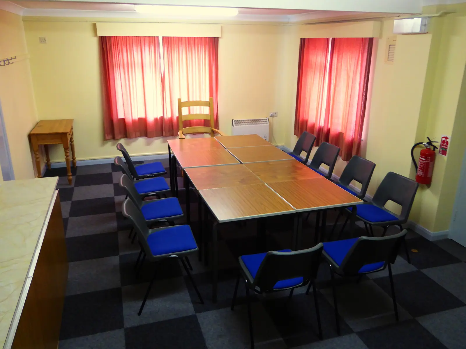 Committee room with tables set out for a meeting